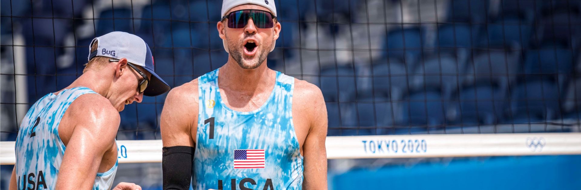 Volleyball player Jake Gibb celebrating on the court